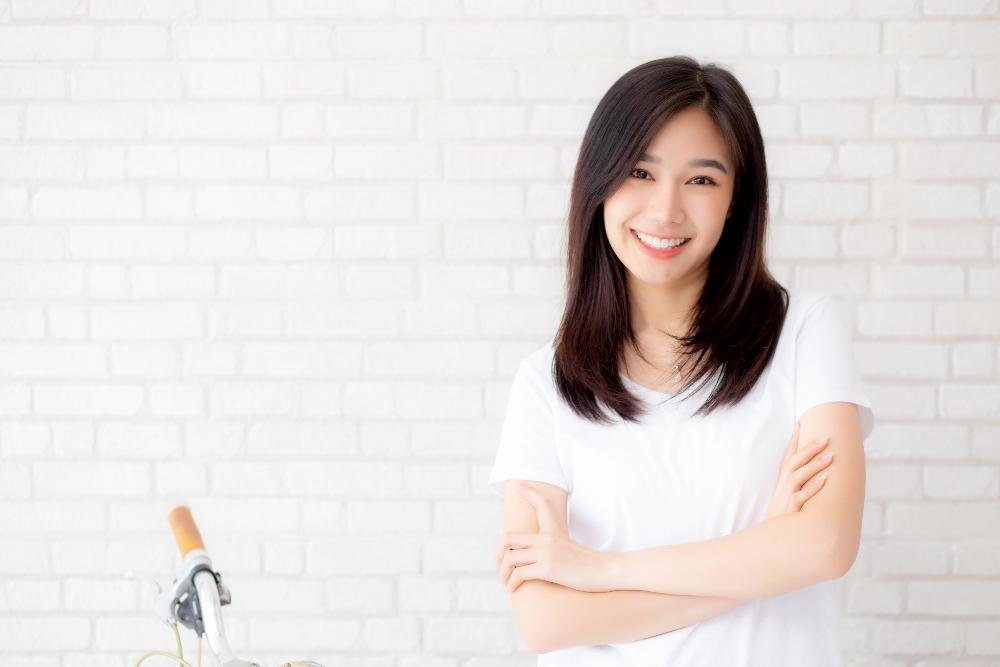 woman with black hair smiling | veneers los gatos ca