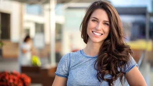 woman in blue shirt smiling | los gatos dentist
