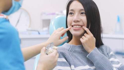 woman smiling at dentist | dentist los gatos ca