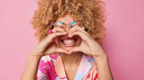 woman with curly hair with sunglasses | icon resin infiltration near me