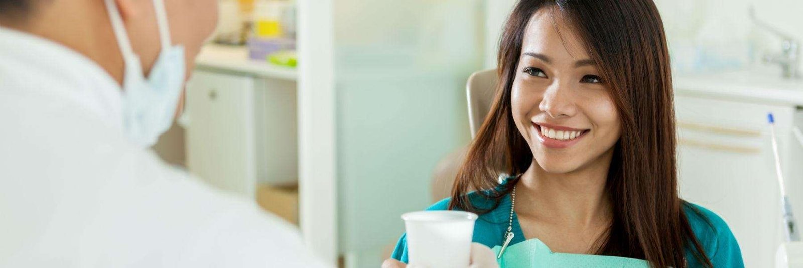 woman smiling in los gatos dental office after dental bonding